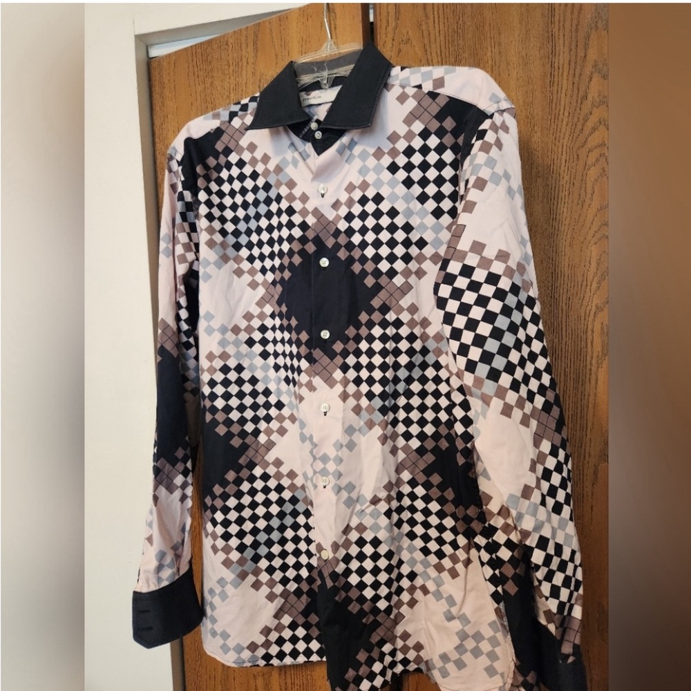 This is a 1970s-style button-down shirt featuring geometric optical art pattern. - Picture 1 of 6